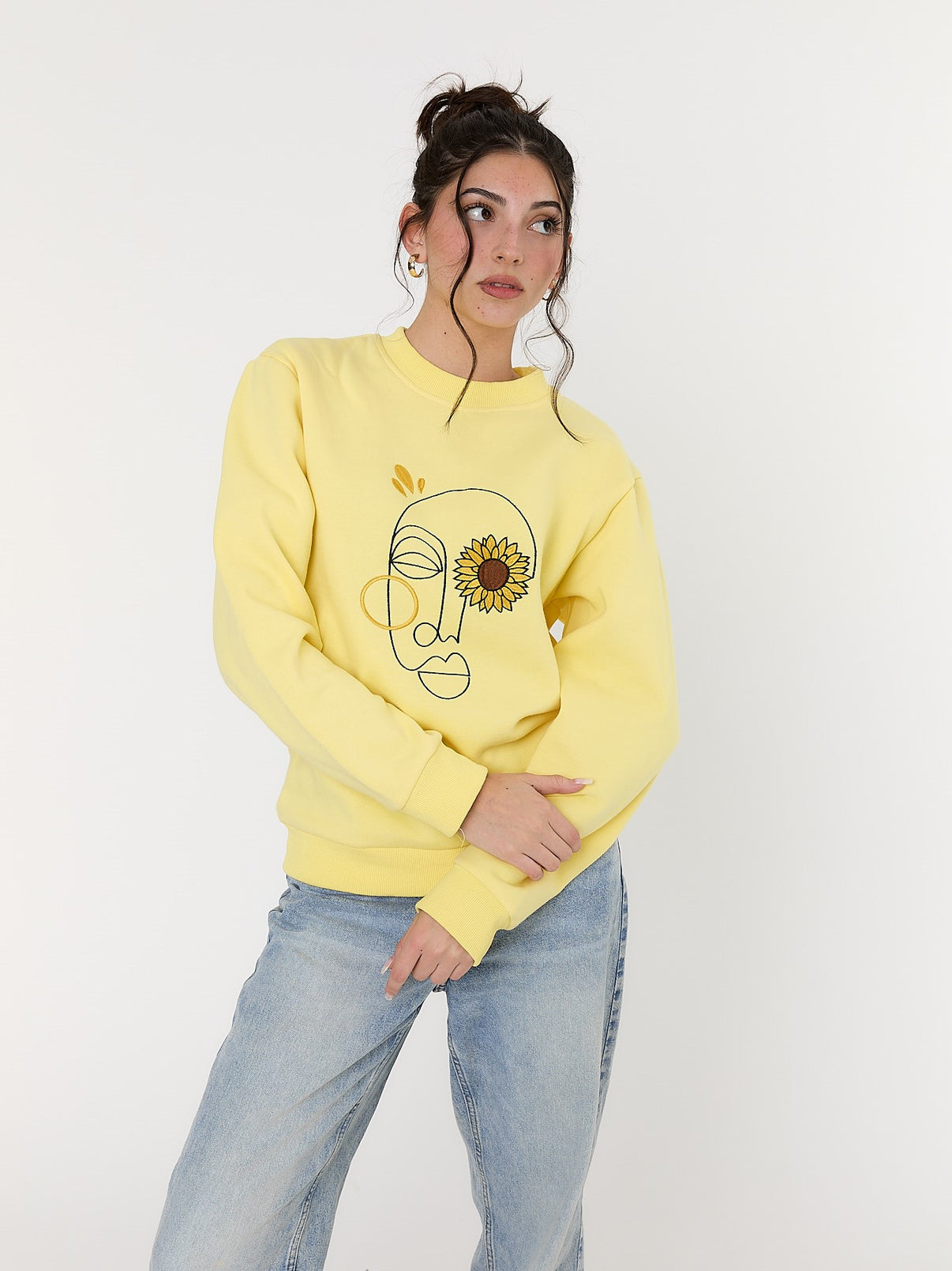 In Their Eyes Yellow Sweater – Shatha Al Dafai